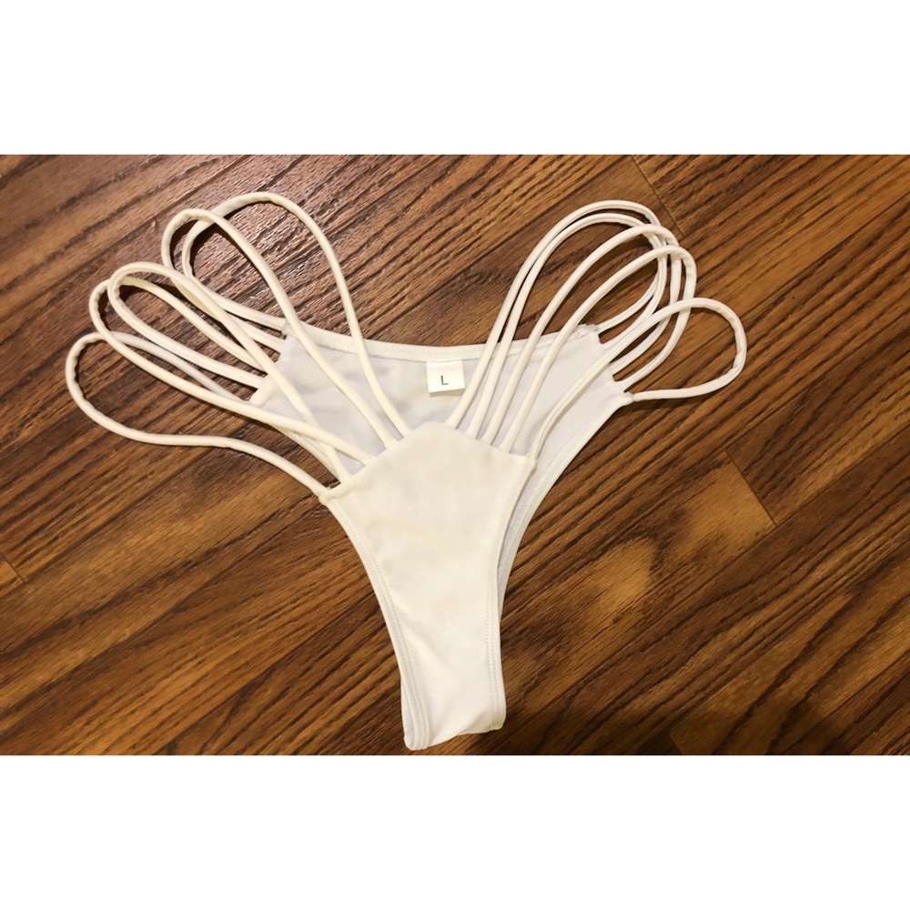 White strappy bathing suit bottoms